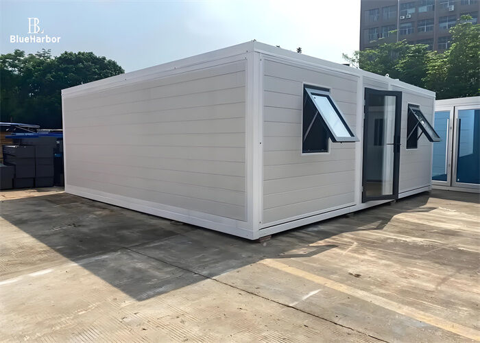 White Elegant Flat-roofed Expandable Container House with 5.68*2.68*2.48 Meter Inner Size and Stone Coated Steel Roofing Tile